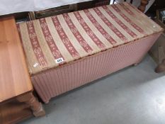 A wicker ottoman.