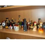 A shelf of miniature spirits etc.