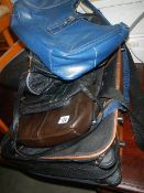 A suitcase and other bags.