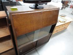 A bureau with a glazed middle shelf a/f