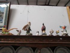 A Country Artists barn owl on water pump and other figures.