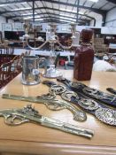 2 martingales, a pair of ornamental brass pistols, a leather flask, candelabra etc.