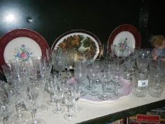 A shelf of glasses and glassware.
