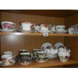 2 shelves of tea ware.
