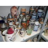 A mixed lot of pottery tankards, beer steins etc.
