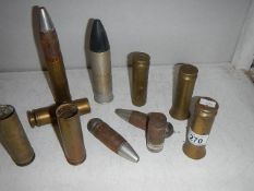 A quantity of brass gun shells.