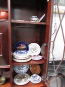 A quantity of collector's plates and a porcelain egg.