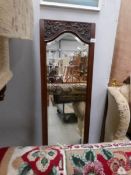 A mahogany framed bevel edged mirror.