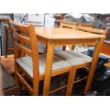 A table and 2 chairs,