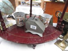 2 1911 enamel commemorative beakers and a pewter coal scuttle sugar caddy.