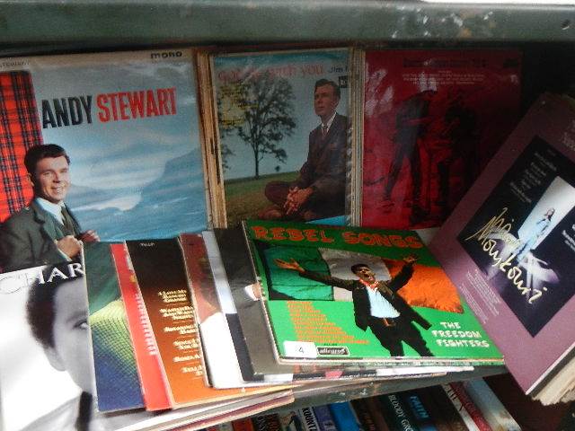 A shelf of assorted LP records.