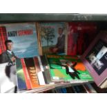 A shelf of assorted LP records.