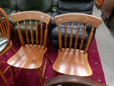 A pair of kitchen chairs,