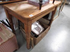 A pine kitchen table.