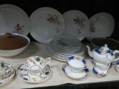 A dinner set, a tea for 2 set and 2 tea cups and saucers.