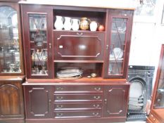 A mahogany effect wall unit.