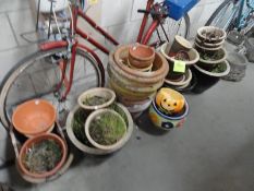 A large quantity of plant pots,