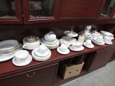 A large quantity of dinner ware.