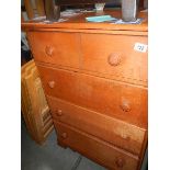 A 2 over 3 oak chest of drawers,.