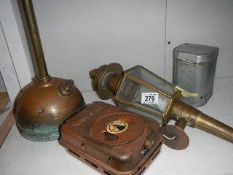 2 old camping stoves, a Tilley lamp a/f and a brass wall light.