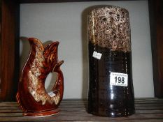 A Cornish 'Gurgle' jug and an art pottery vase.