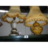 3 table lamps with shades.