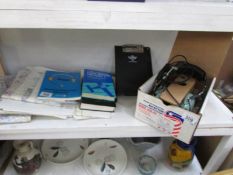 A quantity of air navigation items including maps, pilot books,