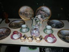 A shelf of miscellaneous ceramics including collector's plates.