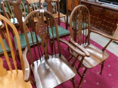 A pair of wheel back elbow chair,