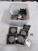 A box of 100 crowns and four 5 shilling coins.