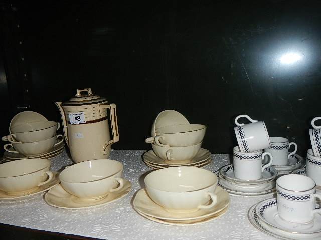 A shelf of assorted tea ware etc.