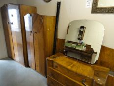 A mid 20th century bedroom suite comprising 2 wardrobes,