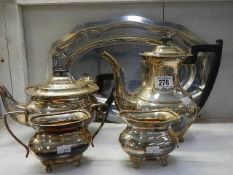 A 4 piece silver plate tea set on tray.