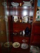 4 shelves of china including commemorative.