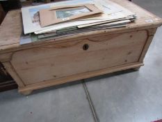 A pine blanket box.