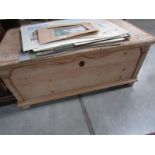 A pine blanket box.