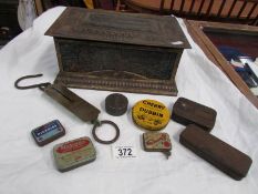 A mixed lot of old tins, Salter pocket balance etc.