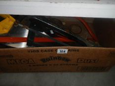 A box of saws etc.