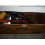 A box of saws etc.