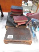 An early King James Bible (possibly 17th century, some pages missing) and other bibles.