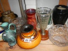 A shelf of vases etc.