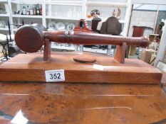 An auctioneer's gavel on stand.