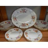 19 pieces of Royal Crown Derby dinner ware.