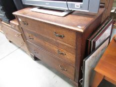 An oak 3 drawer chest.