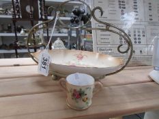 A miniature Royal Worcester loving cup and a Crown Devon dish on plated stand.