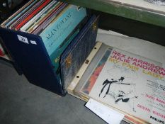 A shelf of LP records.