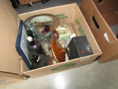 A mixed lot including glass bottles, vintage camera etc.