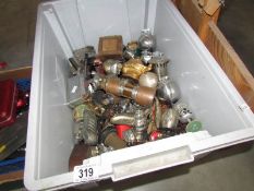 A quantity of lighters including shoes, lamps, globes, sport and other novelty.
