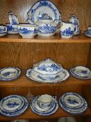 A large quantity of early Royal Doulton blue and white tea and dinnerware.