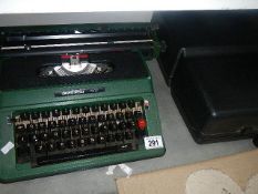 A Silver Reed typewriter.